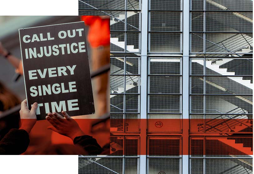 a person holding a sign that says call out injustice every time
